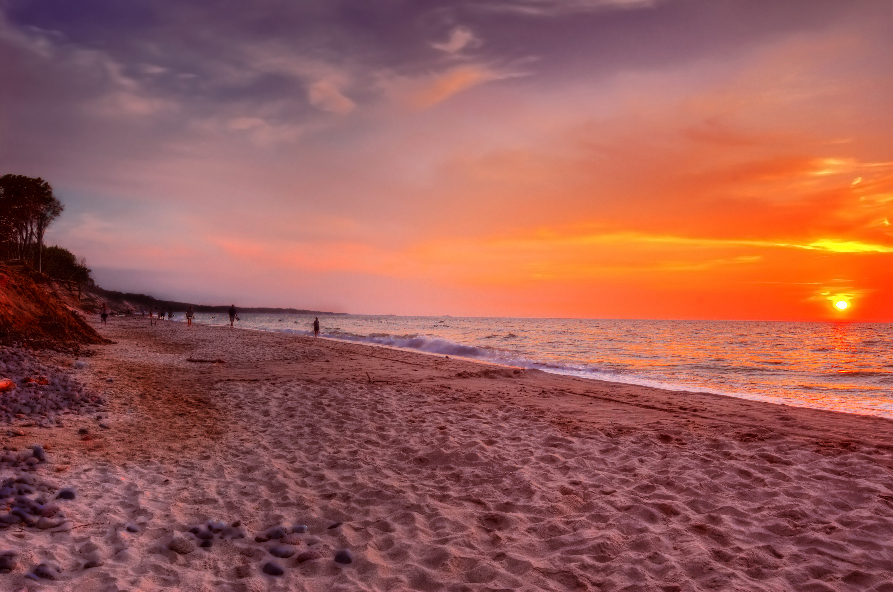 A tranquil beach at sunset